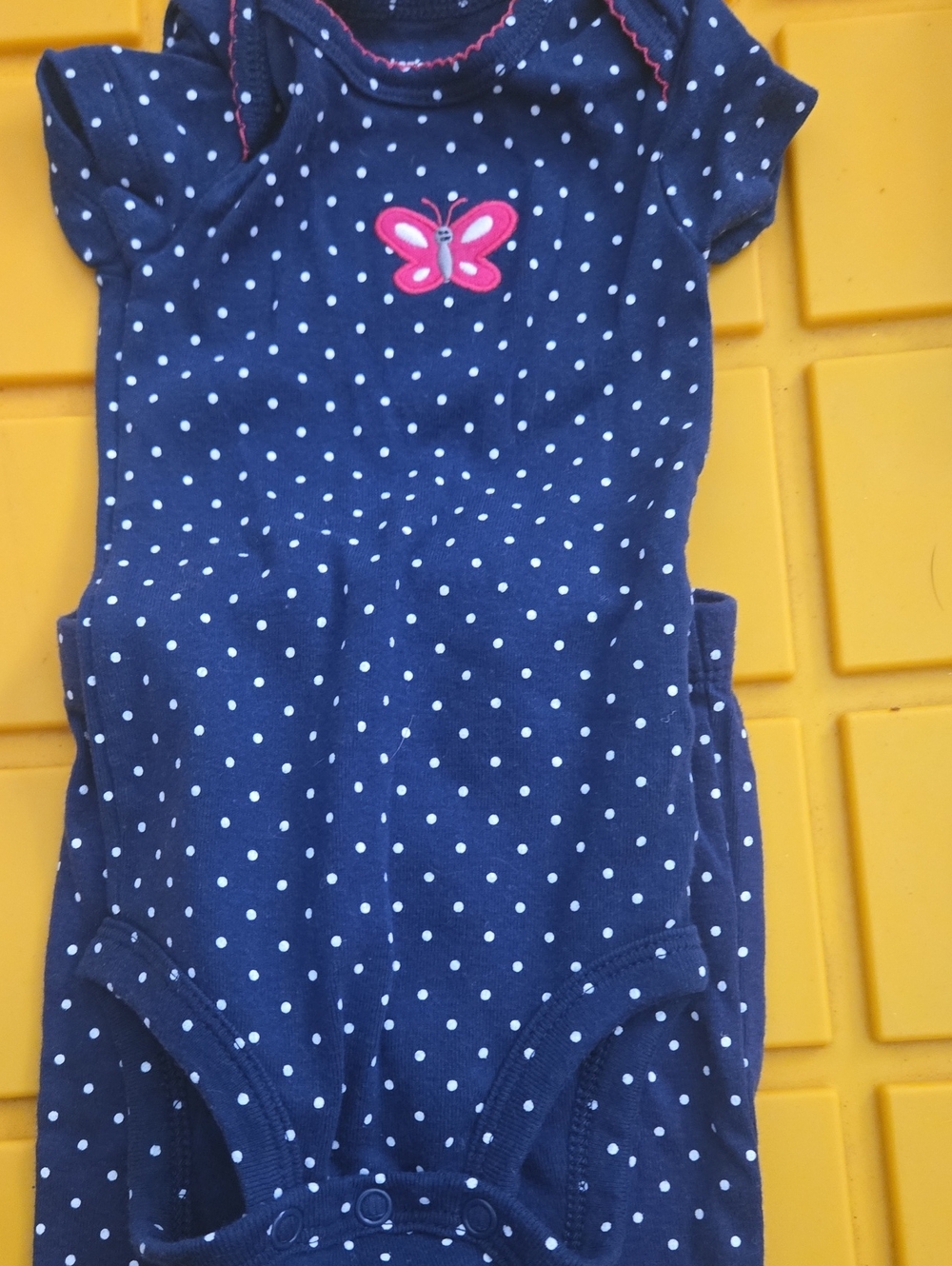 Carter's Onesie with polka dots and matching leggings.